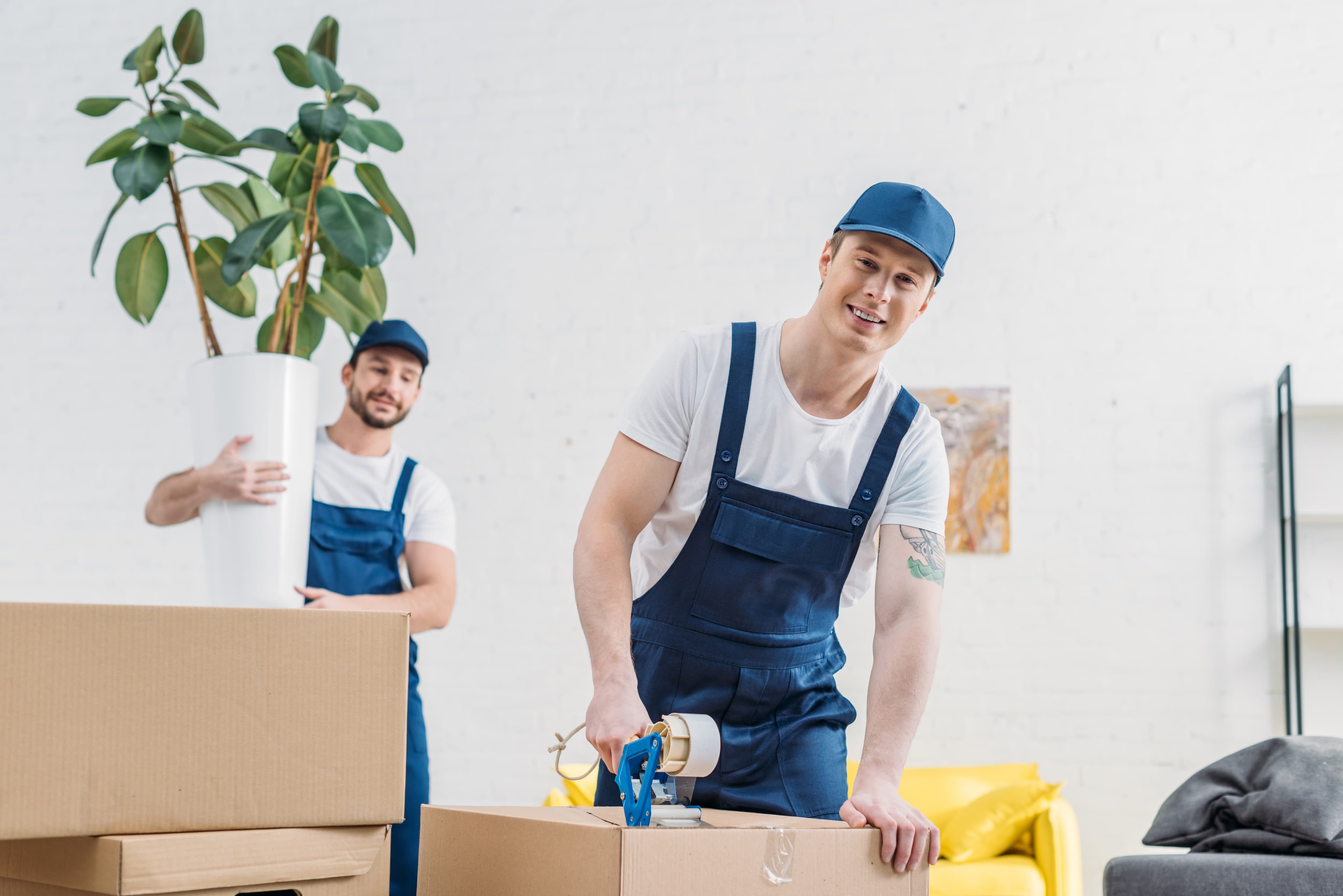 Karma Movers crew carefully wrapping furniture during a St. Petersburg FL move